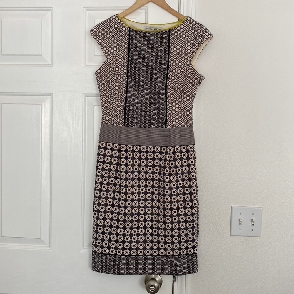 Maggie London contemporary dress with chartreuse green piping on the collar.